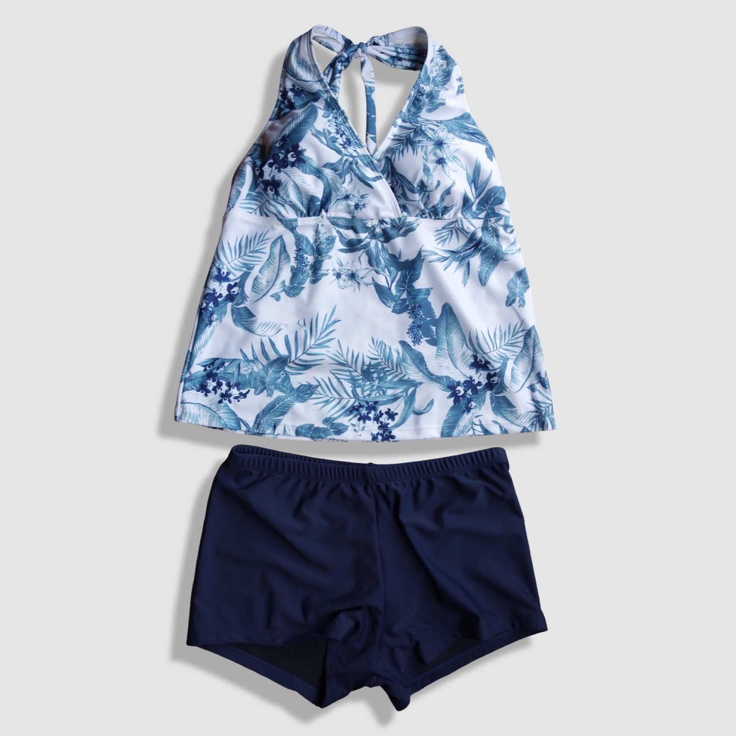 Two Piece Tying Halter Top Tankini Set - Blue and White Hawaiian Floral Pattern, with Navy Shorts